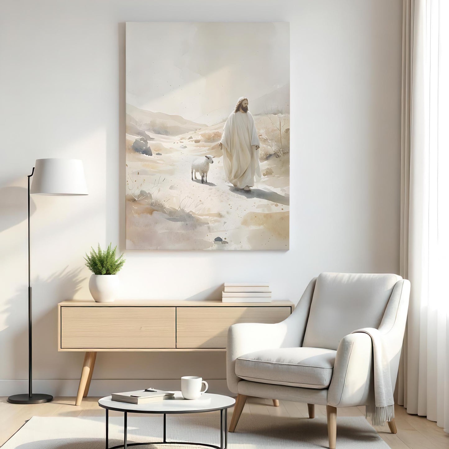 A modern living room with a large canvas of Jesus walking with a lamb. The space includes a neutral armchair, a wooden sideboard with books and a plant, a floor lamp, and a round coffee table, creating a calm and minimalist atmosphere.