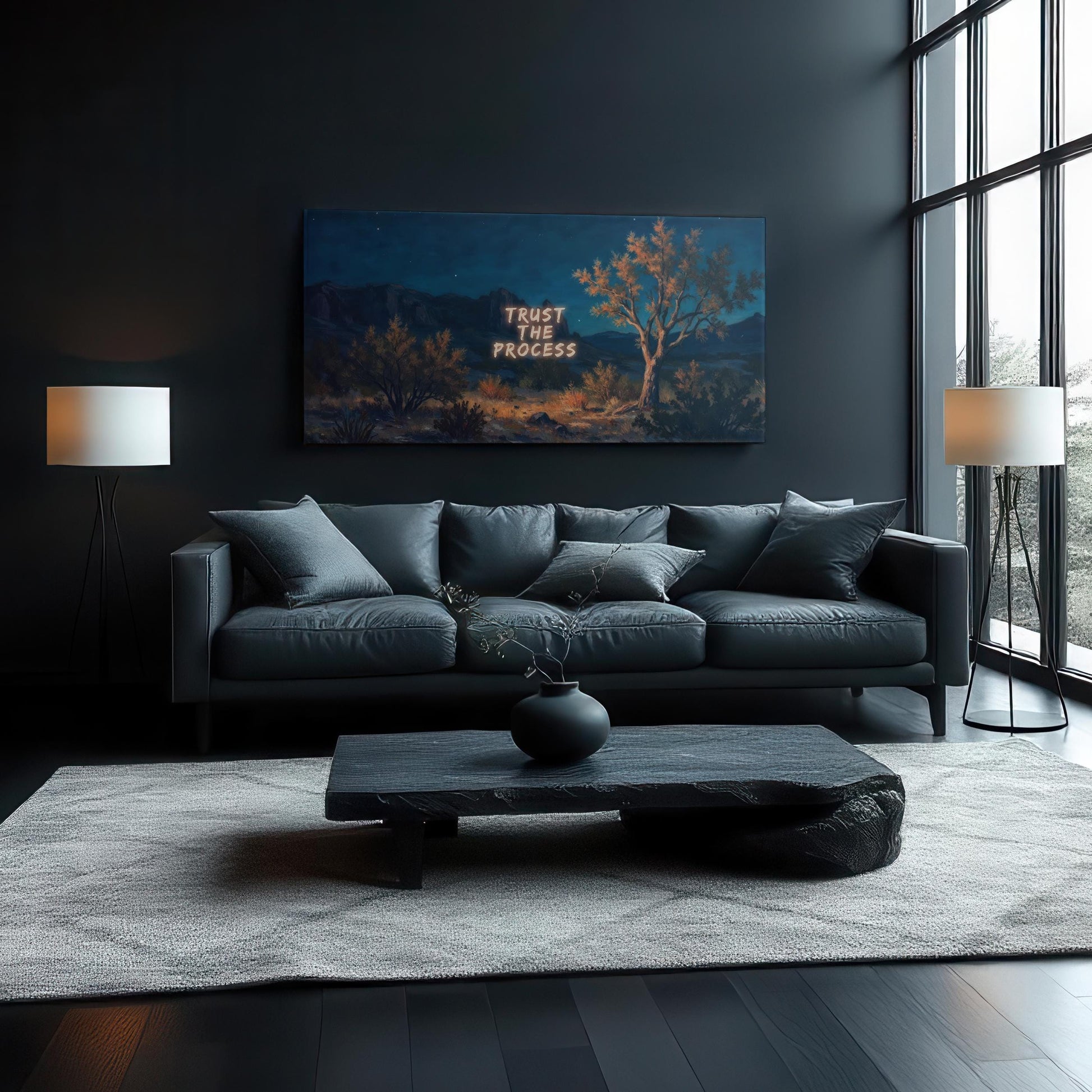 Modern living room featuring &quot;Trust the Process&quot; canvas art with a desert nightscape, adding motivational and serene vibes to sleek decor.