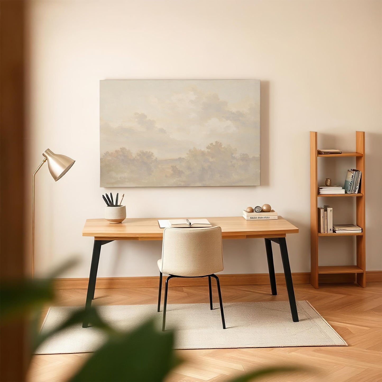 Neutral landscape canvas wall art in a modern, minimalist home office. Styled with a wooden desk, cozy chair, soft lighting, and warm decor for a calming workspace.