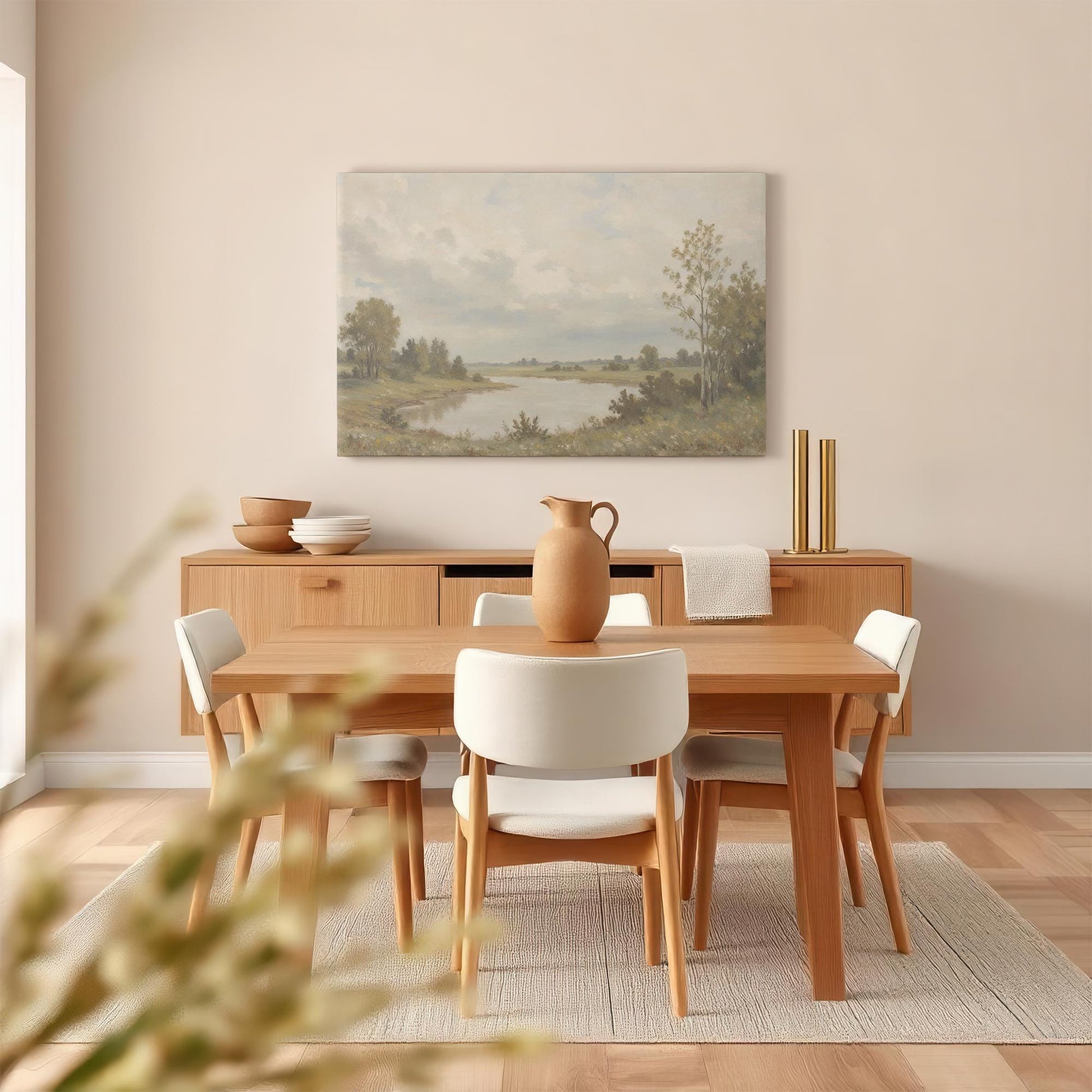 Rustic landscape canvas displayed in a modern dining room. Styled with a wooden table, ceramic dishware, and warm decor for a cozy, nature-inspired setting.