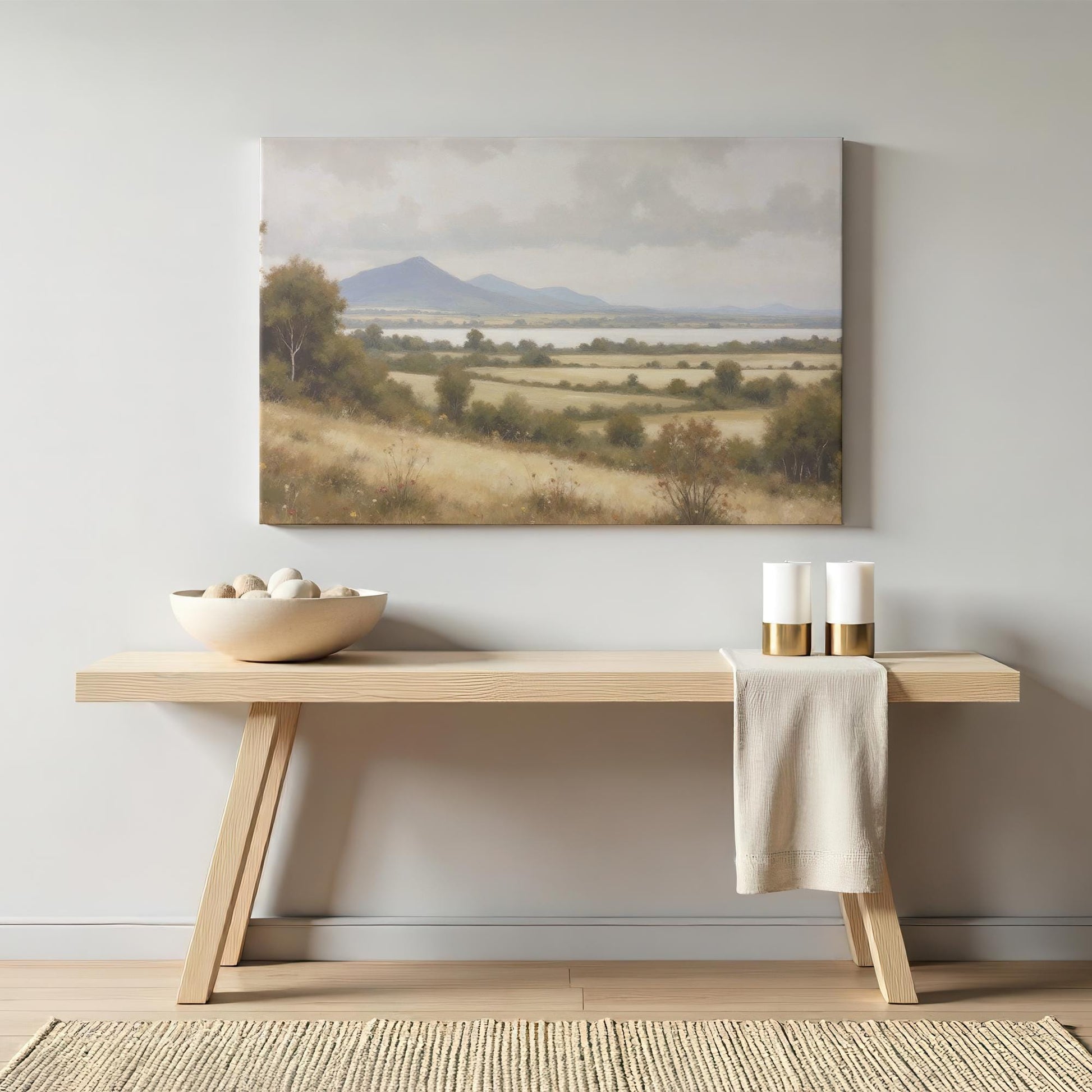 Oversized countryside landscape wall art featuring a tranquil valley, distant blue mountains, and a calm lake. Perfect for farmhouse and country-style interiors.