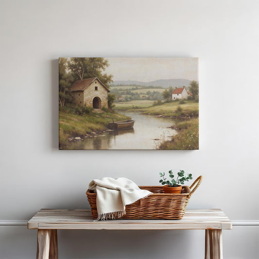 Rustic river landscape canvas wall art displayed above a wooden console with a woven basket, neutral throw, and greenery. Perfect for farmhouse, vintage, or countryside home decor.