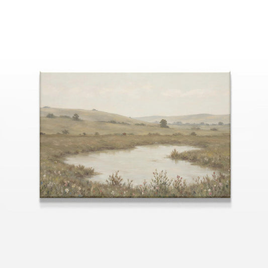 Serene landscape canvas art featuring a tranquil pond surrounded by rolling hills and wildflowers. A soft, neutral-toned painting perfect for nature-inspired wall decor in living rooms, bedrooms, or offices.