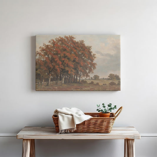 Rustic autumn landscape canvas wall art above a wooden console table. Styled with a woven basket, cozy throw blanket, and potted greenery for a warm, inviting touch. Perfect for farmhouse, vintage, or traditional decor.