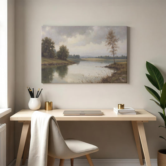 A modern workspace with the landscape canvas print hanging above a wooden desk, accompanied by a neutral-colored chair, books, and decorative gold accents, blending a natural aesthetic with contemporary design.