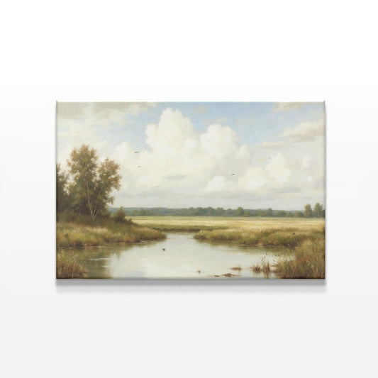 A detailed close-up of a countryside landscape canvas print with a tranquil river, tall grasses, and a bright sky filled with soft clouds. The artwork captures a peaceful, rural setting perfect for farmhouse or country-style home décor.