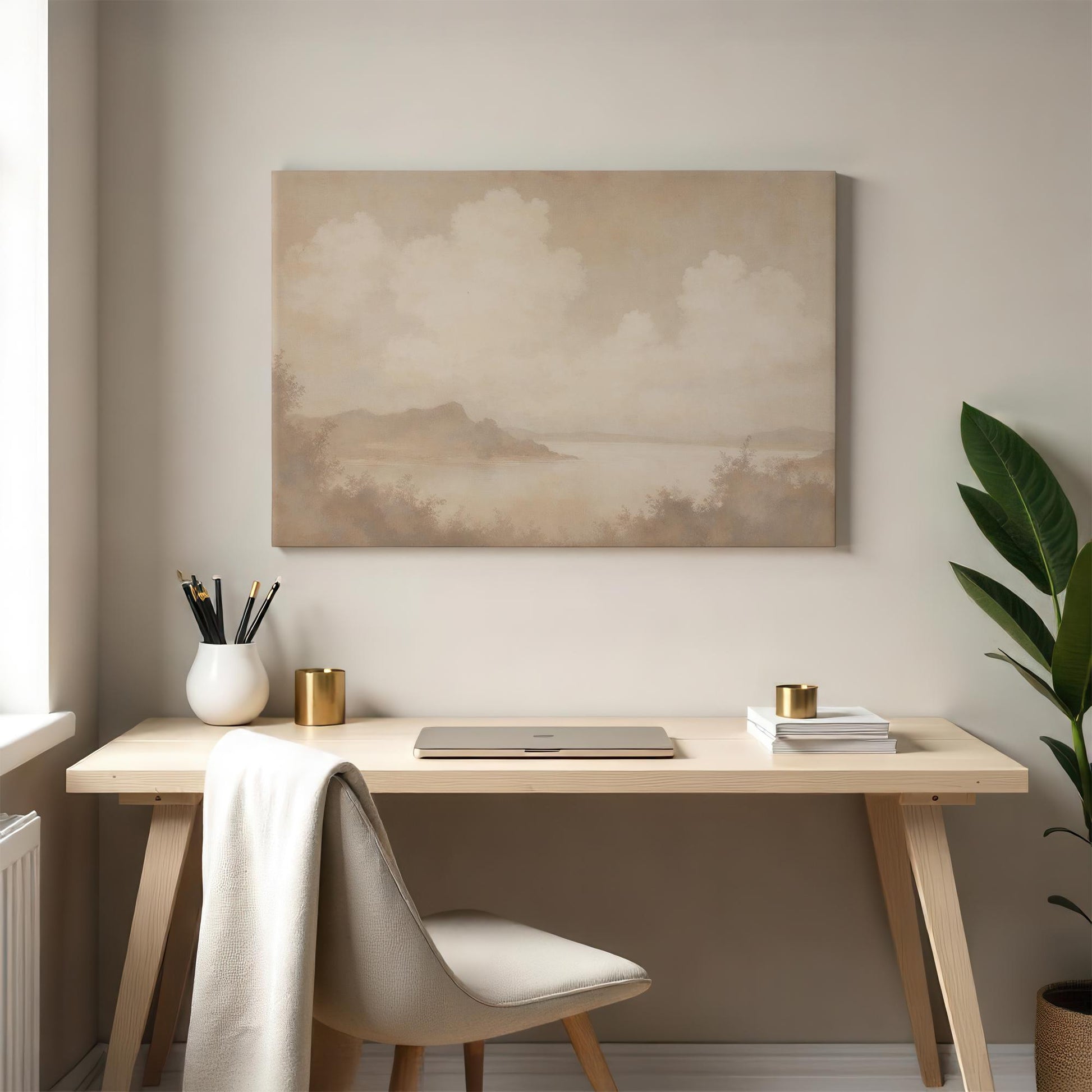 Neutral landscape canvas wall art featuring a dreamy lake and rolling hills. Styled in a modern home office with natural elements, perfect for creating a calming workspace.