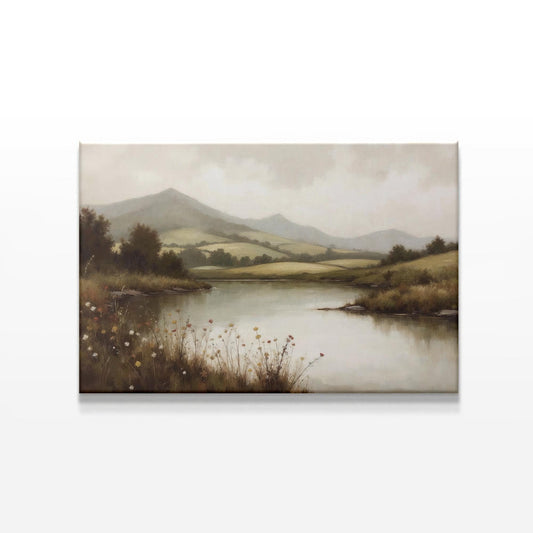 Serene landscape canvas wall art featuring rolling green hills, a calm river, and wildflowers. Styled in a minimalist home with a sleek wooden console, neutral décor, and soft lighting for a tranquil aesthetic. Perfect for rustic and modern spaces.