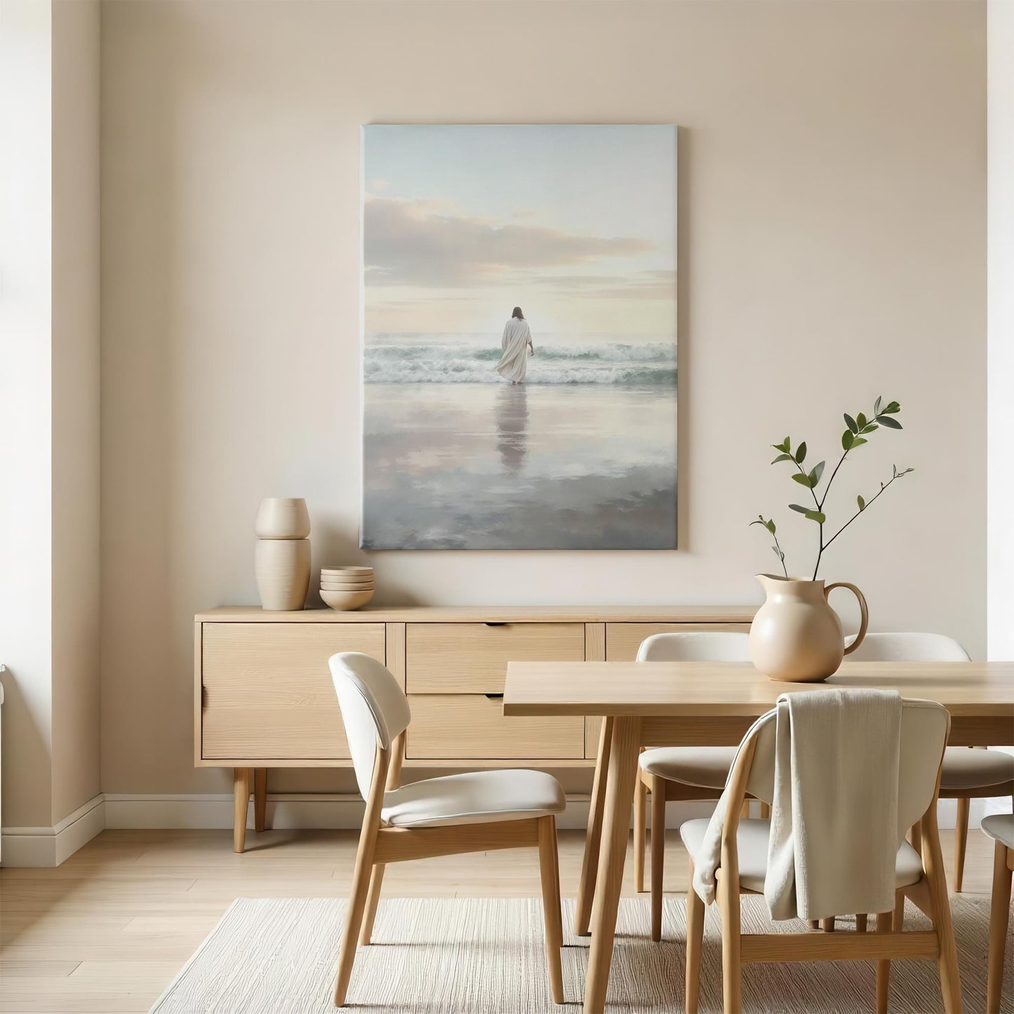 A bright dining area with neutral tones, showcasing a large canvas of Jesus walking on the beach, bringing a calming, inspirational atmosphere to the space.