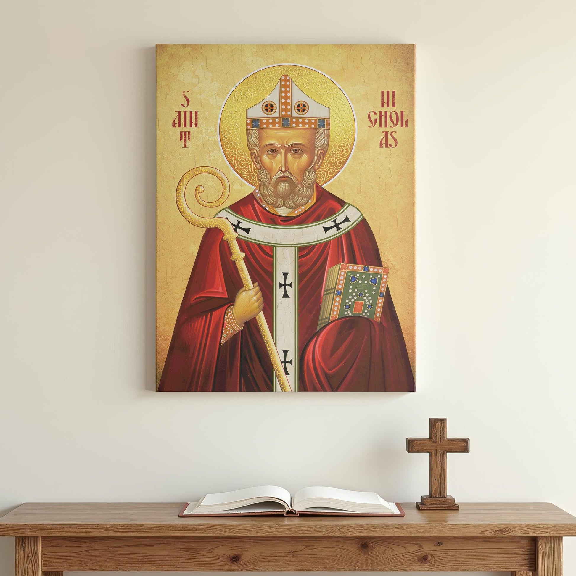 Orthodox icon of Saint Nicholas displayed on a minimalist white wall above a wooden prayer table with an open book and a small wooden cross. Soft lighting creates a peaceful, contemplative atmosphere.