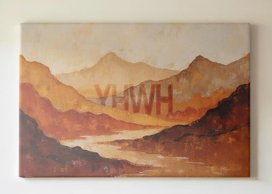 A statement Christian wall art piece featuring soft, layered mountain ranges in desert tones of rust, ochre, and clay with the word “YHWH” subtly integrated into the horizon. Displayed above a minimalist wood dining table with candles and neutral decor, the canvas brings peace and reverence into the home. This unframed version showcases the art’s rich texture and warmth. Perfect for modern Christian interiors seeking Scripture-inspired visual serenity.