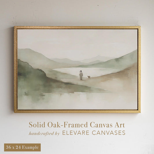 Minimalist Christian wall art featuring a soft-toned landscape with Jesus walking beside a small lamb, printed on solid oak-framed canvas. This serene mountain-inspired piece blends gentle greens and neutrals, ideal for faith-based home decor. Perfect for buyers searching for Christian canvas prints, framed scripture artwork, or peaceful religious wall decor.