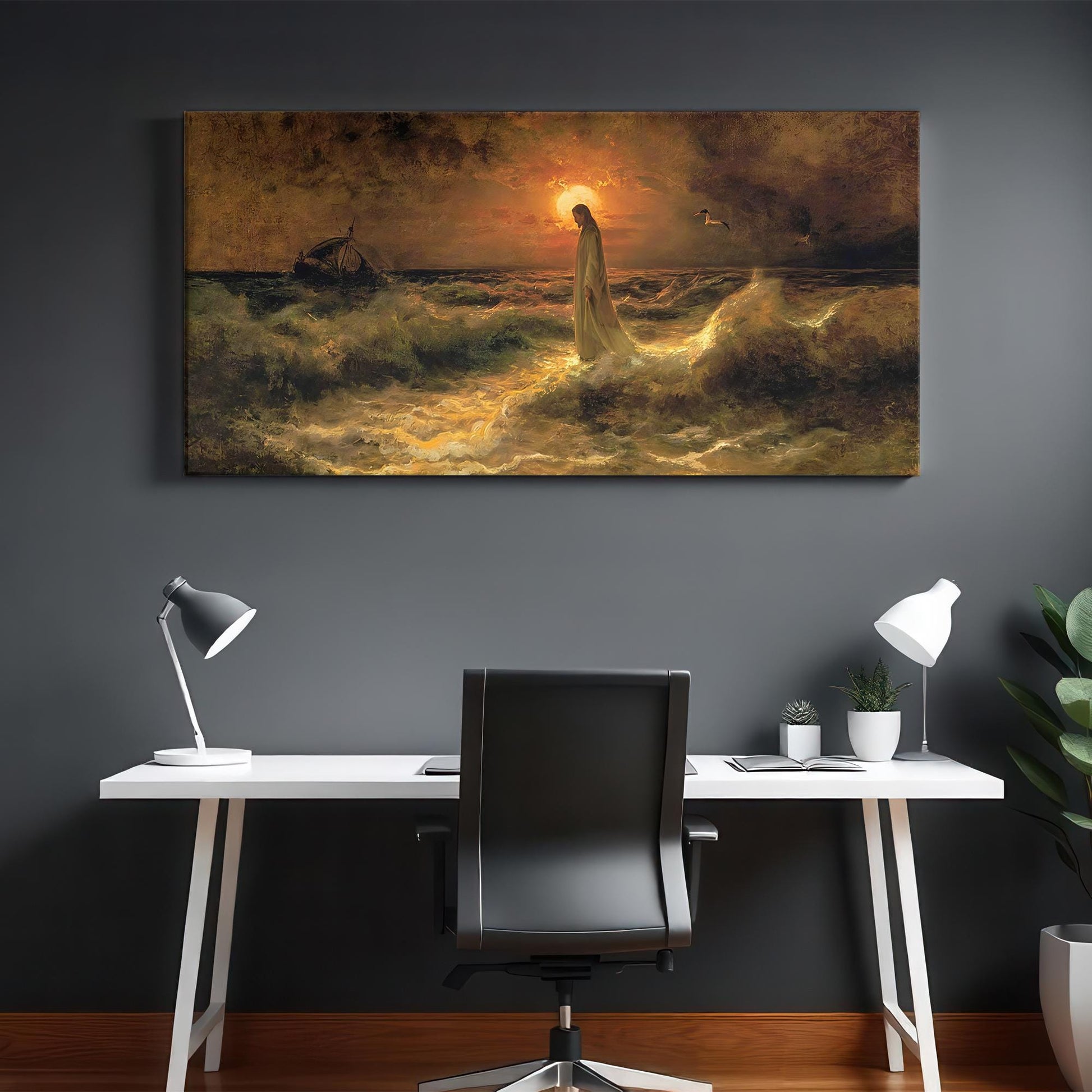 Faith-based canvas artwork of Jesus walking across the sea at sunset, glowing with radiant light against a stormy sky. Shown in a minimalist home office with dark gray walls and clean white furniture, this unframed 36x18 canvas creates a powerful spiritual atmosphere—ideal for Christian professionals seeking daily inspiration through sacred art.